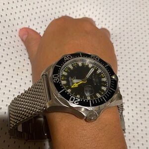 Invicta Pro Diver Black and Silver Watch with Yellow Accents